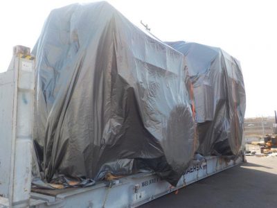 Corn Harvester Wrapped in Grey Tarp